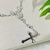 Pulseira Terço com Perolas e Pingente Cruz - comprar online