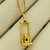 Colar Menino no Balanço em Banho Ouro 18k - comprar online