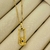Colar Menino no Balanço em Banho Ouro 18k