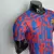 Camisa Barcelona Treino 22/23 Jogador Nike Masculina - Azul e Gréna - comprar online