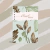 Caderno A5 "Blessed" capa verde folhagem. Caderno de anotações cristão com design moderno.