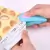 Mini Máquina Seladora a Pilha Colorida Com Imã de Geladeira Pratica e Rápida - comprar online