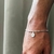 PULSEIRA MEDALHA COM INICIAL PERSONALIZADA na internet
