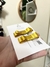 Par de Laços Dourados Chanel na Presilha Baby