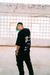 Camiseta Oversized City Hunters Preta na internet