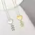 Colar Coração com Menino em Zircônias - Semijoia Ouro 18K - comprar online