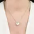 Colar Relicário Coração com Micro Zircônias Cristal - Semijoia Ouro 18k - loja online