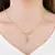 Colar Bolinhas Escrita Mãe de Menina com Zircônia Rosa - Semijoia Ouro 18K - comprar online
