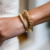 Bracelete Torcido com Micro Zircônias - Semijoia em Ouro 18K
