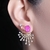 Brinco Rosa Fucsia fusion e cristais com zircônias - Em ouro 18k - comprar online