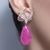 Brinco rosa fucsia fusion cravejado com zircônias - Em ouro 18k