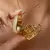 Colar Relicário Longo Regulável Coração cravejado com Micro Zircônias - Semijoia em Ouro 18K - Semijoias e Acessórios de Luxo | Dandara Barreto Joias
