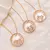 Colar Mandala Filhos Amor De Mãe com Detalhes em Madre Perola e Micro Zircônias - Semijoia em Ouro 18K - comprar online