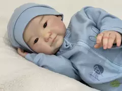 BEBÊ REBORN REALISTA CAI CARECA