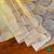 784/116- Encaje PVC Gotas Dorado - comprar online
