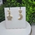 Brinco com Design de Estrela e Lua Cravejados Semijoia em Ouro 18k - comprar online