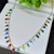 Colar com Estrela e Miçangas Coloridas Semijoia em Prata