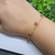 Pulseira com pingentes de Cristal Rosa Semijoia em Ouro 18k na internet