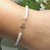 Pulseira de Mini Pérolas interligadas com Estrelas Vazadas Semjioia em Prata