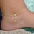 Tornozeleira com Pingente de Crucifixo Vazado Semijoia no Ouro 18k