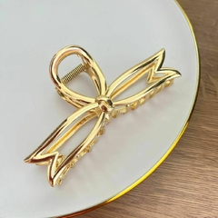 Presilha de Garra Laço Dourado