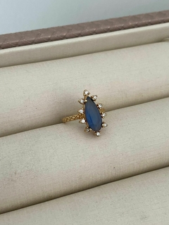 Anel Gota Azul banhado a Ouro na internet