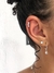 Piercing fake três zircônias