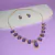 Conjunto Pedraria Gotas Lilas Com Zirconia