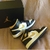 Air Jordan 1 Mid Black University Gold