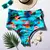 Calcinha biquíni hot pants azul clara com estampa de estrelas do mar, conchas marinhas e folhas de coqueiro. Cintura alta e com forro
