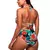 Parte de baixo de biquíni estilo hot pants com desenho de flores na cor vermelha. Possui cintura alta e é completamente forrada.
