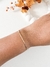 Pulseira Bolinha Achatada Banhado a Ouro - comprar online
