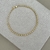 Pulseira esferas ouro