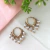 Argola Articulada com Pérolas l Banho de ouro 18k