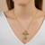 Colar com Cruz Verde Turmalina l Banho de ouro 18k - comprar online