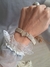 Pulsera plata y oro centro corazón en internet