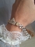 Pulsera plata y oro centro corona en internet