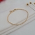 Pulseira Cabo de aço Banhada a Ouro - comprar online