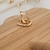 Argola Curva Cravejada Banhado a Ouro - comprar online