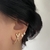 Brinco Ear Hook em X Banhado a Ouro - comprar online