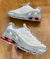 Imagem do Tênis Nike Shox Ride 2 x SUPREME nas cores Branco e Vermelho, com design moderno e detalhes em mesh.