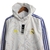 Jaqueta Corta-Vento Real Madrid 21/22 - Masculina Adidas - Branca com detalhes em azul e amarelo na internet