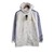 Jaqueta Corta-Vento Real Madrid 21/22 - Masculina Adidas - Branca com detalhes em azul e amarelo
