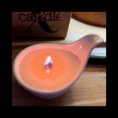 Vela de massagem