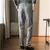 Imagem do Outono/inverno novo cinza calças de lã masculina moda casual calças lixadas