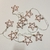LUCES ESTRELLAS METAL ROSE GOLD - comprar online