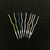 VELAS PERLADAS CON ONDAS VARIOS COLORES POR UNIDAD