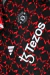 Jaqueta Corta-Vento Manchester United Treino - Masculina Adidas - Preta com detalhes em vermelho na internet