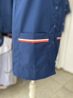 Poncho Crisantemo azul marino - Todo Uniformes