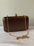 Clutch Retangular Marrom Cintilante na internet